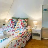 Chambre dans maison individuelle、Saint-Renanのホテル