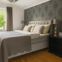 Central mysig villa 5-personer, מלון באודבאלה