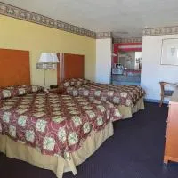 Winnie Inn Suites & RV Park, отель в городе Уинни