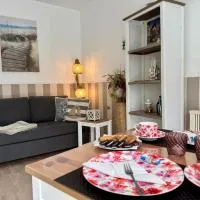 SOLund - Sonne im Herzen - ruhige und sonnige Ferienwohnung mit Terrasse und Garten nahe Strand und Ostsee, готель у місті Шенгаґен