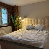 Apartamenty przy parku โรงแรมในแอลบลอง