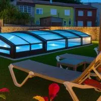 Casa El Rincón de Alberto con Piscina CLIMATIZADA y Calefacción, hotel di Camelle
