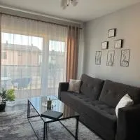 Modern apartment with balcony, хотел в Užliedžiai