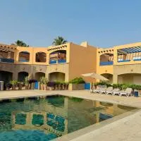 Pieds dans l eau Vue Mer Montagne Piscine, ξενοδοχείο σε Agadir nʼ Aït Sa