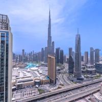 VOGUE DOWNTOWN VIEWS II Luxurious One Bedroom Apartment with Balcony and full Amenities, Opposite Dubai Mall Skybridge, Walkable to Burj Khalifa, hotel in zona Jebel Ali Seaplane Base - DJH, Dubai