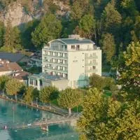 HOP Apartments & Suites، فندق في إنترلاكن
