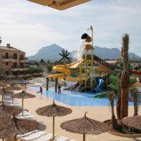 a water park with a water slide and slides at Albir Garden Resort