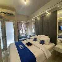 Apartement Transpark Juanda Bekasi By Ensroom، فندق في Padurenan
