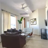 Own It 2 Bed Apartment White, hotel din Islamabad