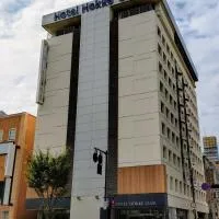 Hotel Hokke Club Oita، فندق في أويتا