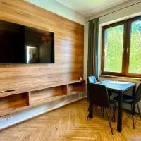 Urokliwy apartament położony na terenie Ośrodka Jeździeckiego Bilcza, 14 km od centrum Kielc, hotel in Bilcza
