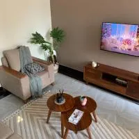 True's cozy homes, hôtel à Kira
