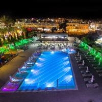 an overhead view of a swimming pool at night at Nicholas Color Hotel, Ayia Napa