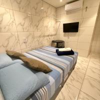 Cantinho aconchegante - Quarto 05 AR-condicionado，位于Bayeux卡斯特罗平托总统国际机场 - JPA附近的酒店