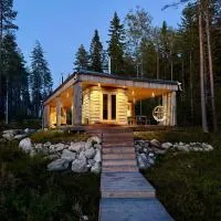 Ulvontähti - moderni mökki järven rannalla, hotel 