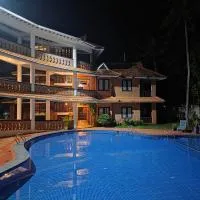 God's Own country Kovalam By Bestinn Leisure, hotel u gradu Vilinjam