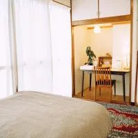 海に恋する泊まれる喫茶店 ポパイ, hotel u gradu 'Iyo'