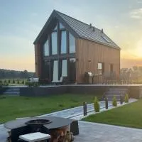 Golden House Mazury - kajaki, grill, jacuzzi w cenie noclegu!, hotelli kohteessa Liwa
