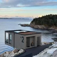 Hideaway Herdla luxurious cabins 15 m above the sea, hotel en Herdla