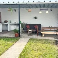 Casa, gran parrillero a pocos minutos de sitios turísticos，米納斯的飯店