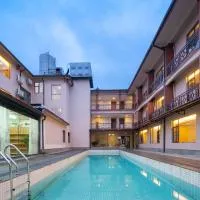 Zhangjiajie Tianchong Yunhai Courtyard Hotel-At the East gate of Zhangjiajie National Forest Park English Butler, Free Luggage Storage, Tour Plan -reserve tickets for various scenic spots-Self-Service Laundry, khách sạn ở Trương Gia Giới