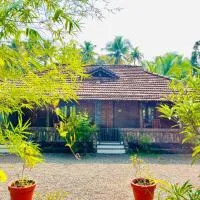 Mundro Garden Homestay، فندق في Munroe Island
