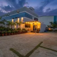 FabHotel Tiru Rooms، فندق في بيون