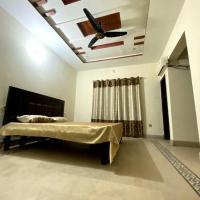 Suites Inn, hotel near Faisalabad International Airport - LYP, Faisalabad