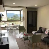Beautiful Loft close to airport,pool gym & parking, hotel di Rionegro