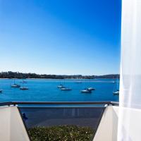 a view of a body of water with boats at The Esplanade Motel, Batemans Bay