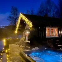 Three bedroom holiday house with jacuzzi in Bjorli , pets allowed, ξενοδοχείο σε Bjorli