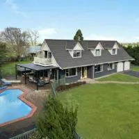 Hamilton Greenhill Lodge - Private Pool & Hot Spa Pool & Fireplace, hotel di Hamilton