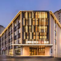 Jin Yi Youxuan Hotel Ulanqab Wanda Branch 2, hotel cerca de Ulanqab Jining Airport - UCB, Jining