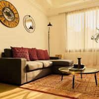 Mid-Century Modern Comfort 1BR, ξενοδοχείο κοντά στο Αεροδρόμιο Bateen - AZI, Άμπου Ντάμπι