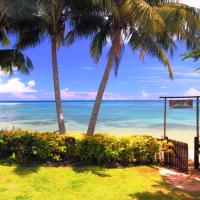 Coconut Grove Beachfront Cottages, hotel in Matei