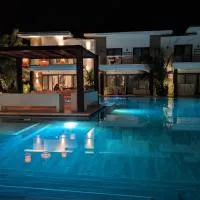 Villas LM Monterrico H8 con salida a piscina, viešbutis mieste Monterrico