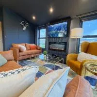 Blackthorn Timber Lodge, מלון בBothel