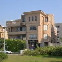 Maison 7، فندق في El Obour