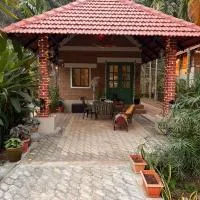 Happy Haven - Boutique Farmstay with Outdoor Shower & Open Air Kitchen, hotell i Mangalore