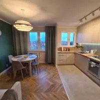 Widok na stawy, hotel a Grodzisk Mazowiecki