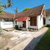 Tania Homestay, מלון בBumbang