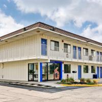 a large white building with blue accents at Motel 6-Pittsburgh, PA - Crafton