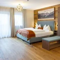 GRETI - Alpine Boutique Hotel mit Alpentherme Eintritt, reichhaltigem Frühstück, Sauna – hotel w mieście Bad Hofgastein