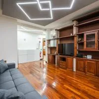 5 min dal Museo Ferrari - 3 BR for family & work, free parking, AC, khách sạn ở Fiorano Modenese