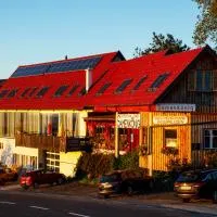 Samenkönig Pschait Handels GmbH, hotel u gradu Gamlic