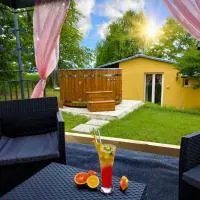 Ranch 66 - Wellness chata Arizona ve stylu Divokého Západu s koupacím sudem a saunou, hotel din Tršice
