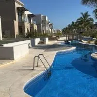 Cosy 1BR with a PUBLIC POOL and WIFI, hotel i Ma‘mūrah