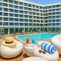 דירה מעוצבת במתחם סי סייד אילת - סטודיו משפחתי נוף לים - By Siesta, hotel em Eilat