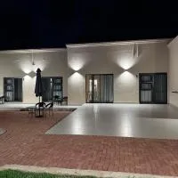 Cathy & P Guesthouse, hotel i Hartbeespoort