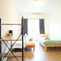Osaka English House, готель у місті Хіраката